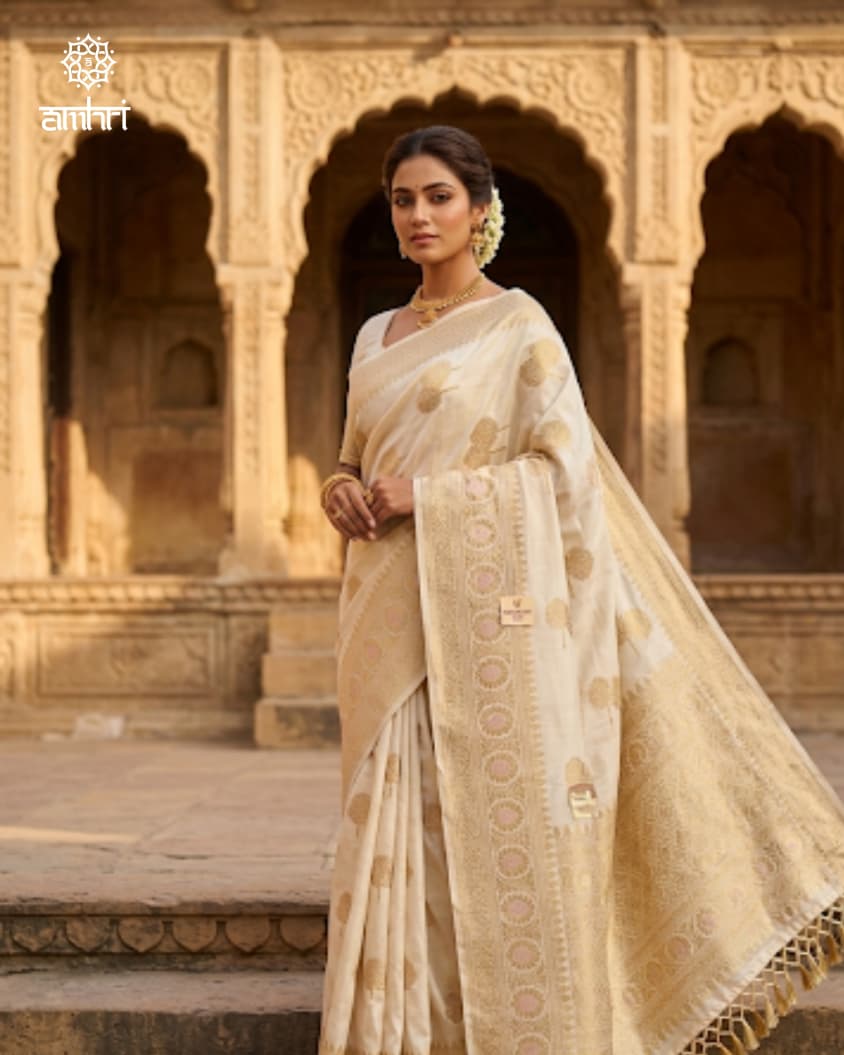 Elegant Off-White Silk Saree with Golden Woven Motifs